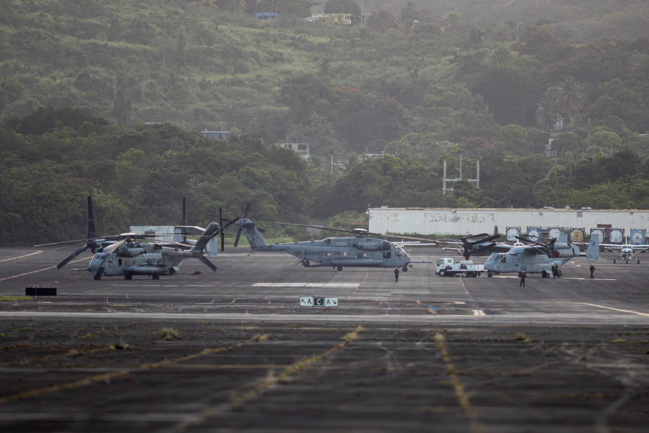 U.S. Marine Corps aircrafts stand parked on the tarmac of the former Roosevelt Roads military base in Ceiba, Puerto Rico, September 10, 2025. REUTERS/Ricardo Arduengo