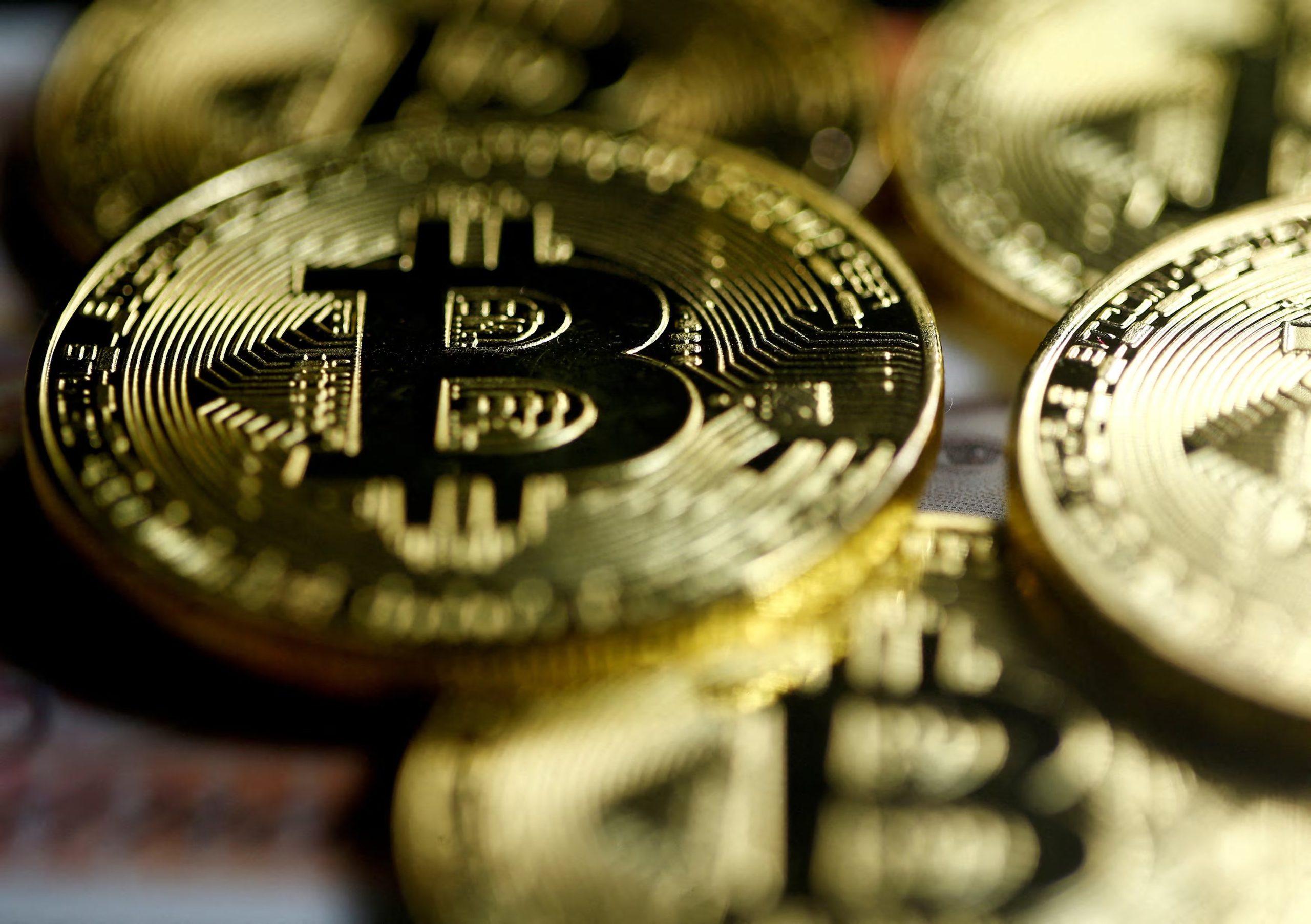FILE PHOTO: Bitcoins are seen in this illustration picture taken September 27, 2017. REUTERS/Dado Ruvic/Illustration/File Photo