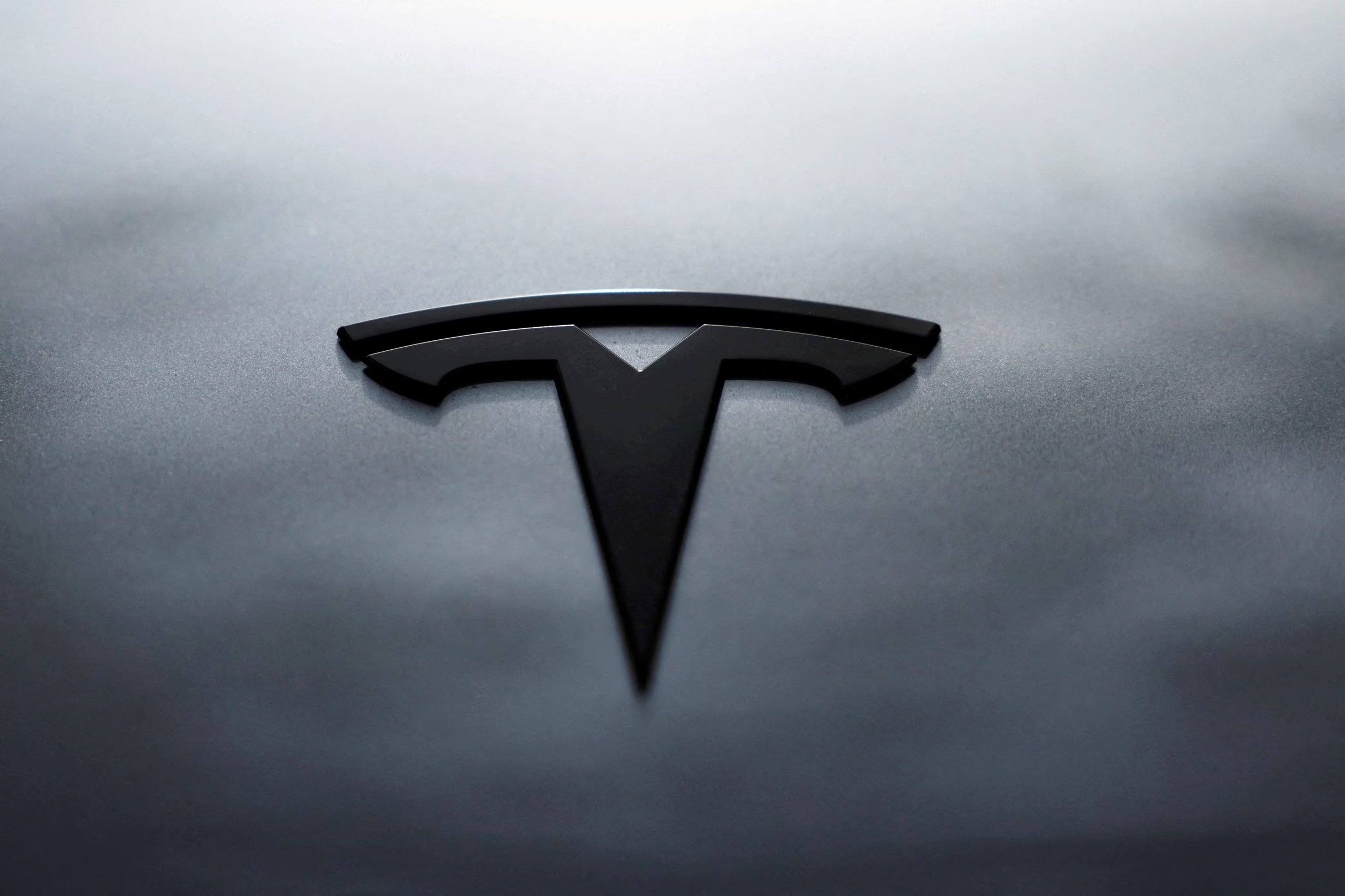 FILE PHOTO: The logo of Tesla is seen on a Tesla Model Y during Tesla Inc.'s official launch in Bogota, Colombia, November 20, 2025. REUTERS/Luisa Gonzalez/File Photo