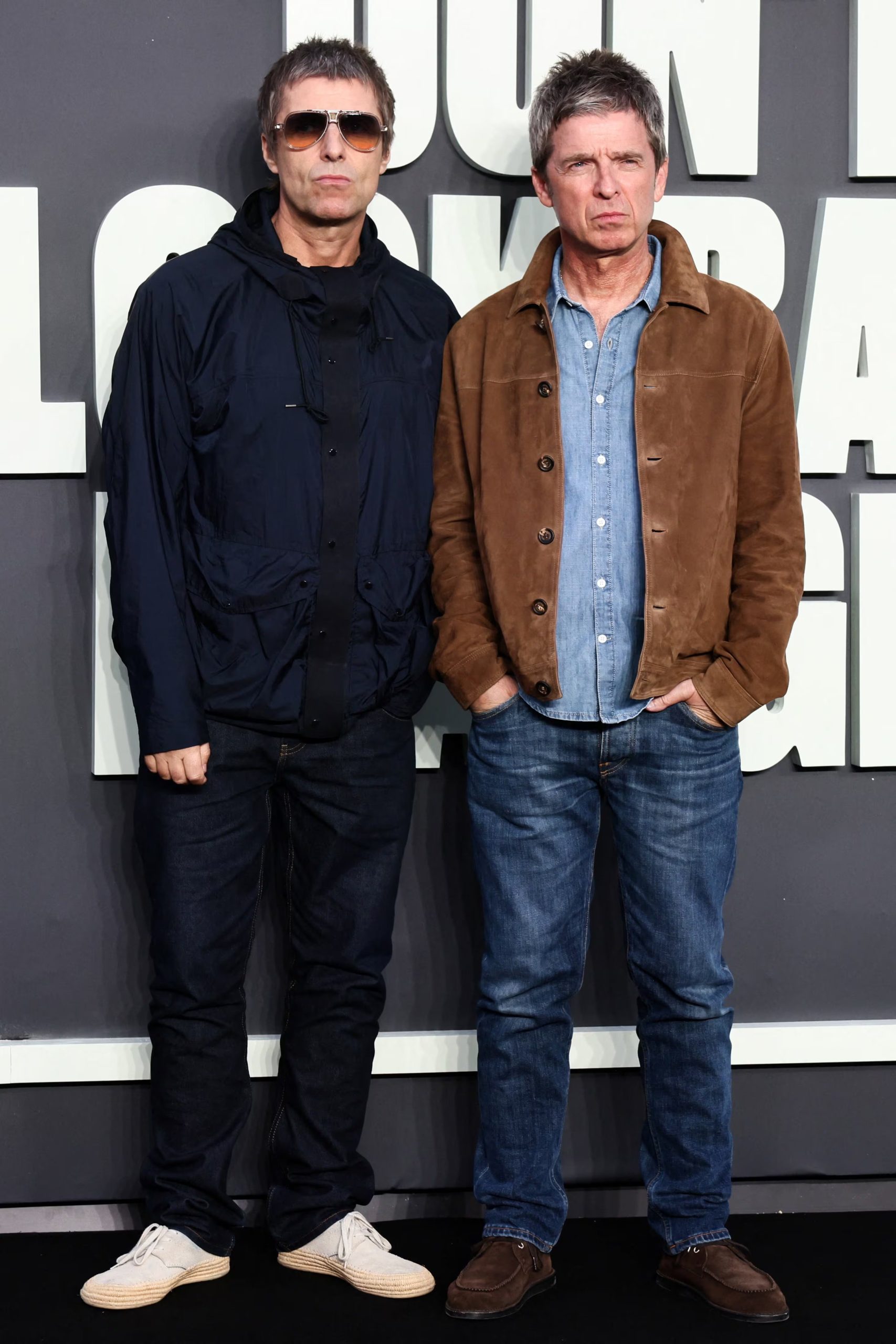 Los dos músicos presentan versiones diferentes del estilo informal asociado con Oasis en Londres (REUTERS/Jack Taylor)