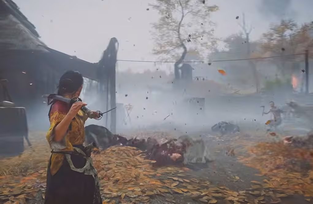 Se observa a la protagonista, Atsu, empuñando sus katanas gemelas en medio de una intensa batalla en un entorno rodeado de hojas secas y polvo.

(Captura YouTube PlayStation)