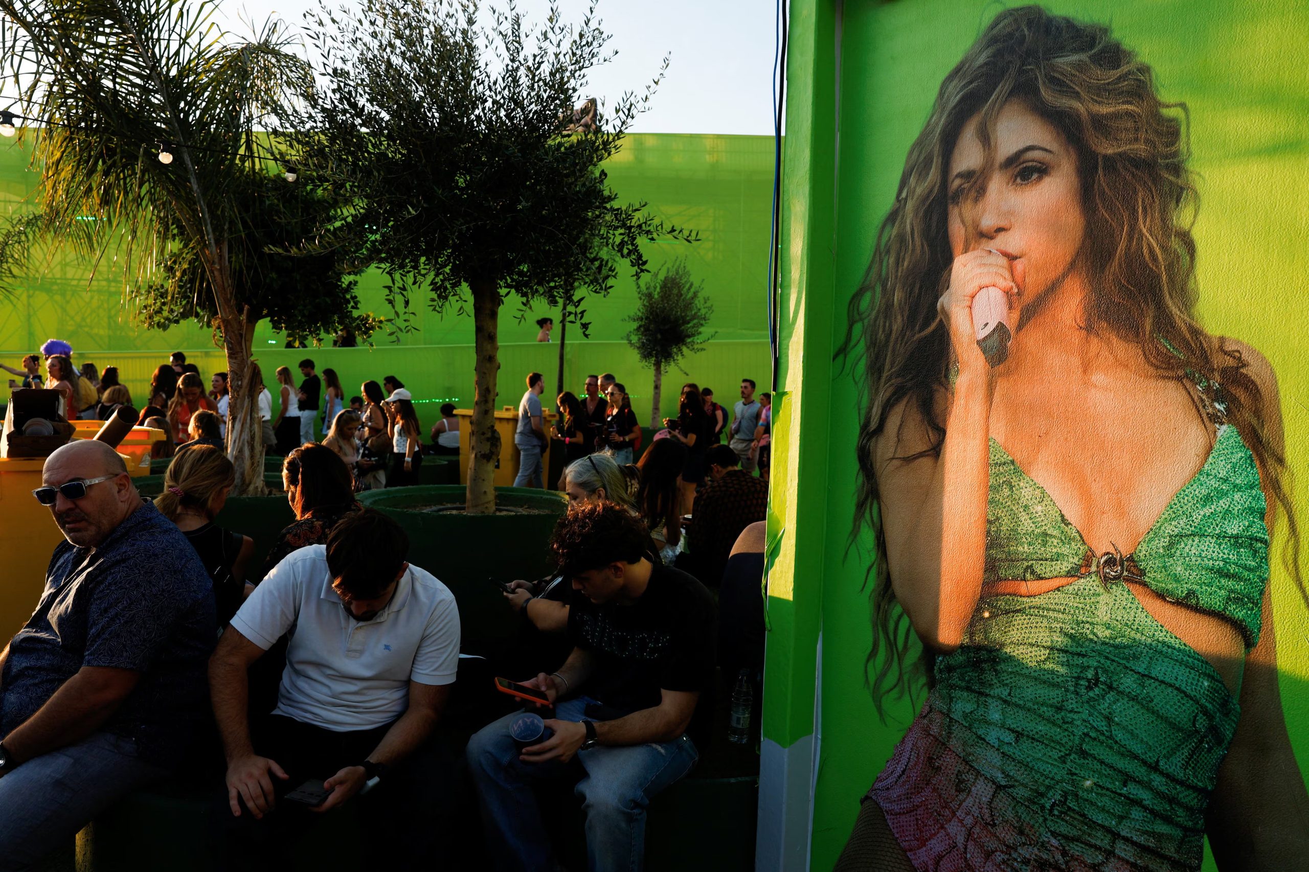 Fans of Colombian singer Shakira visit the entertainment complex Macondo Park built to host her Madrid residency and named after the fictional town in Gabriel Garcia Marquez's One Hundred Years of Solitude, before her opening concert in Madrid, Spain, September 18, 2026. REUTERS/Susana Vera