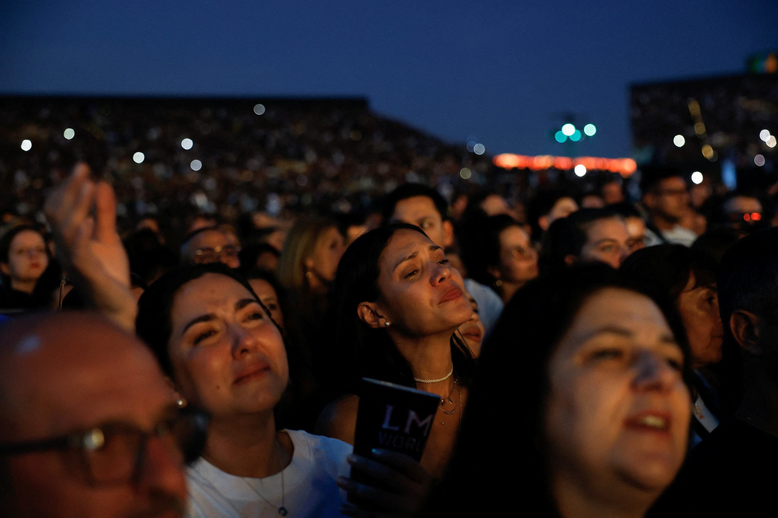 Fans react during the concert of Colombian singer Shakira at the opening concert of her Madrid residency, part of her ‘Las Mujeres Ya No Lloran World Tour’ at 'Shakira Stadium' in Madrid, Spain, September 18, 2026. REUTERS/Susana Vera