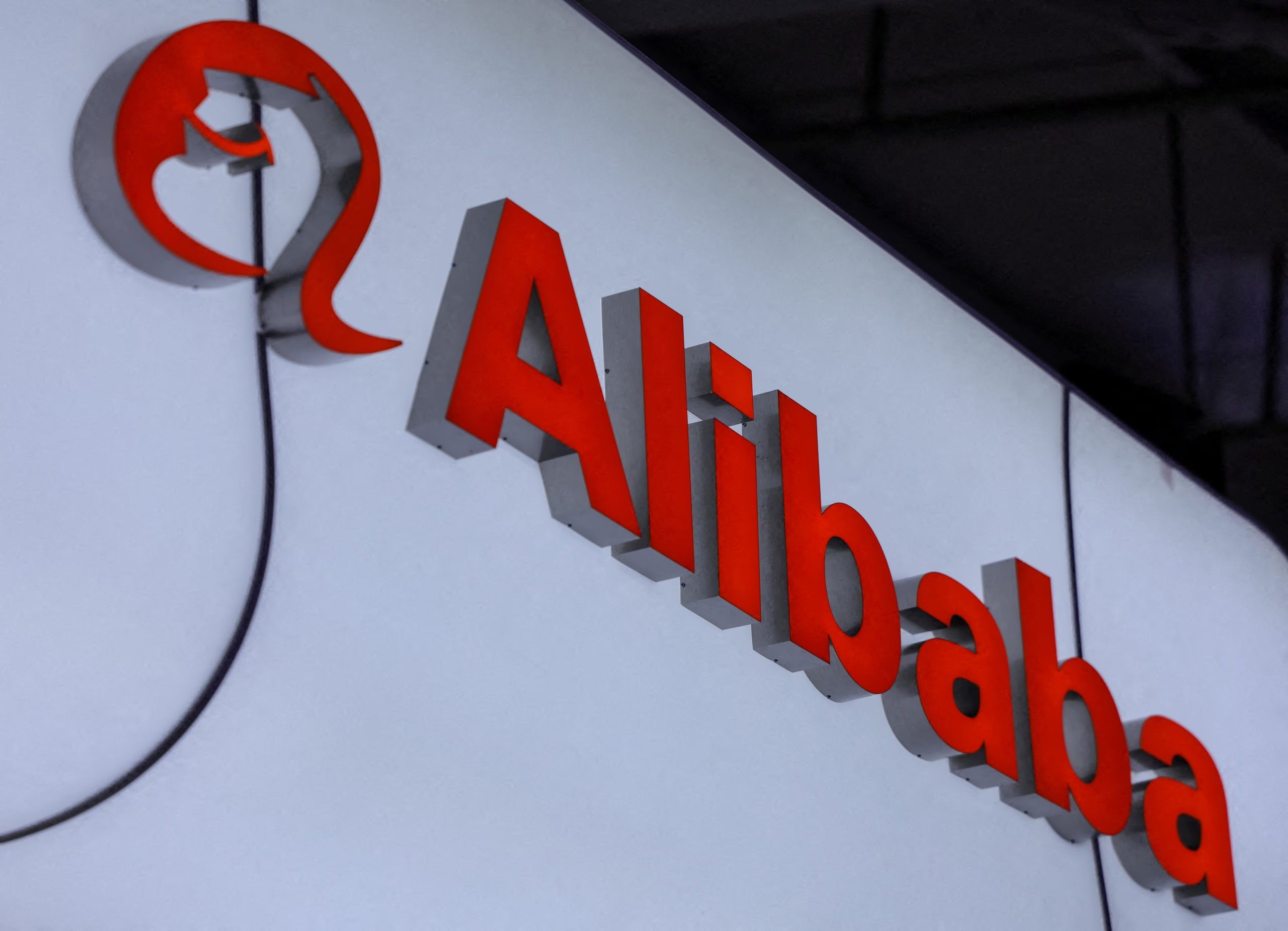 FILE PHOTO: An Alibaba logo is displayed at the company's booth at China International Fair for Trade in Services (CIFTIS) in Beijing, China, September 10, 2025. REUTERS/Maxim Shemetov/File Photo